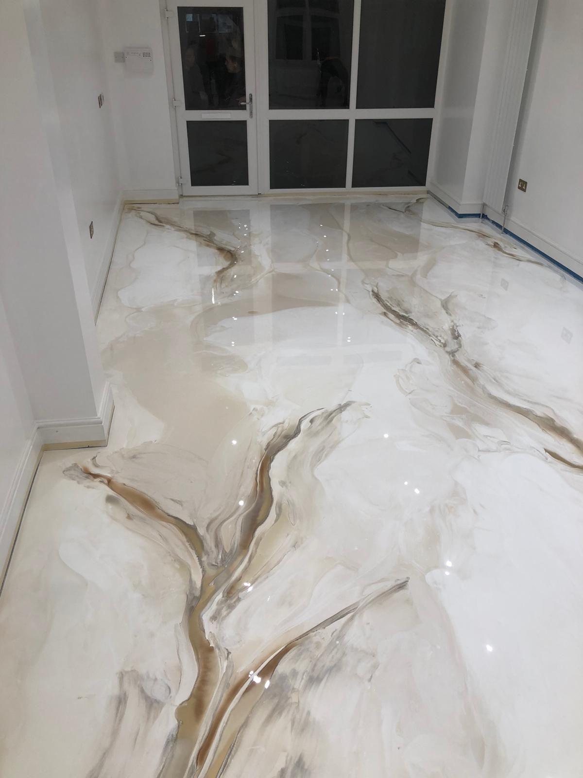 Marble effect epoxy flooring installed by Concrete Doctor in Dubai