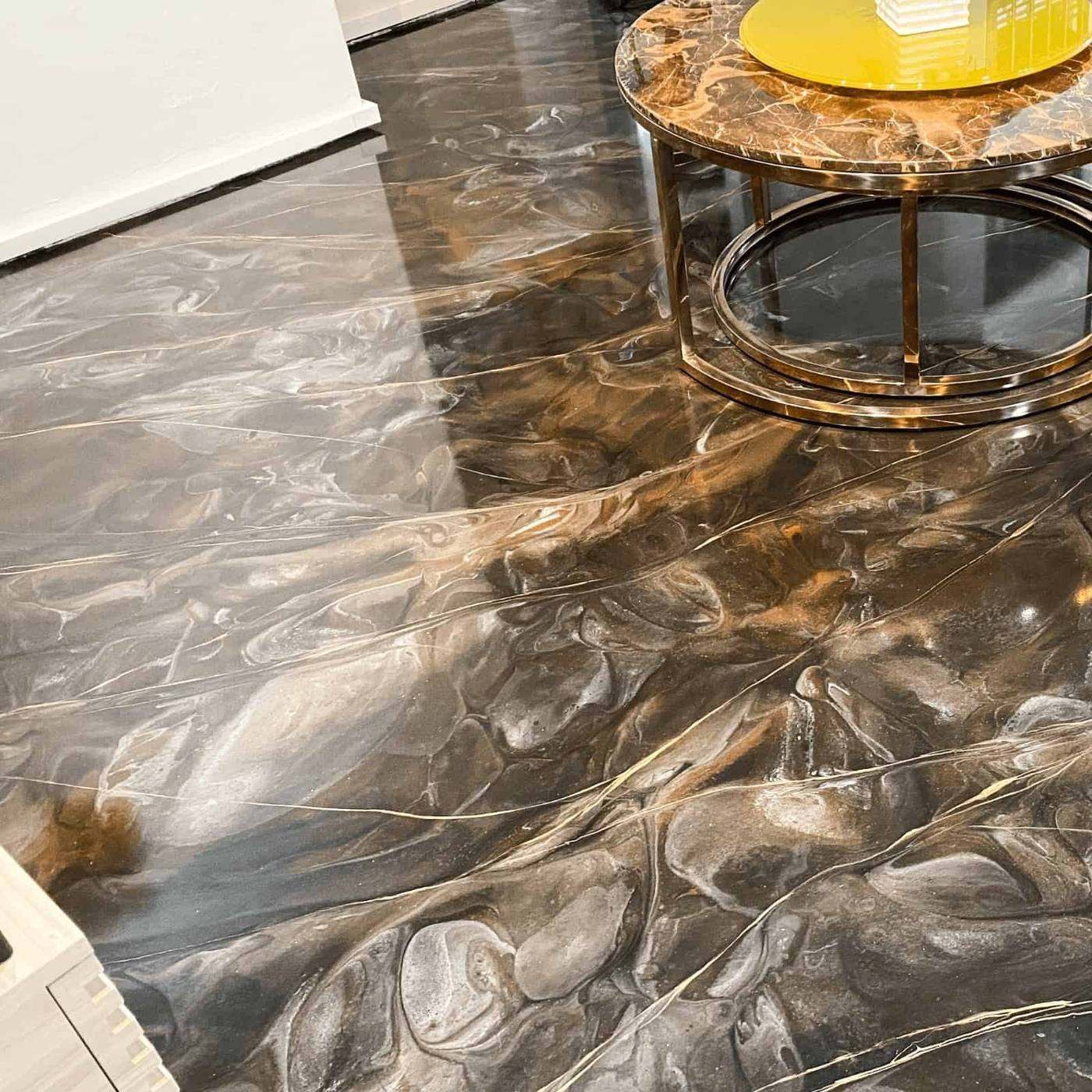 Metallic epoxy feature flooring installed by Concrete Doctor in Dubai