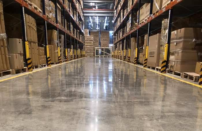 Warehouse epoxy flooring installed by Concrete Doctor in Dubai